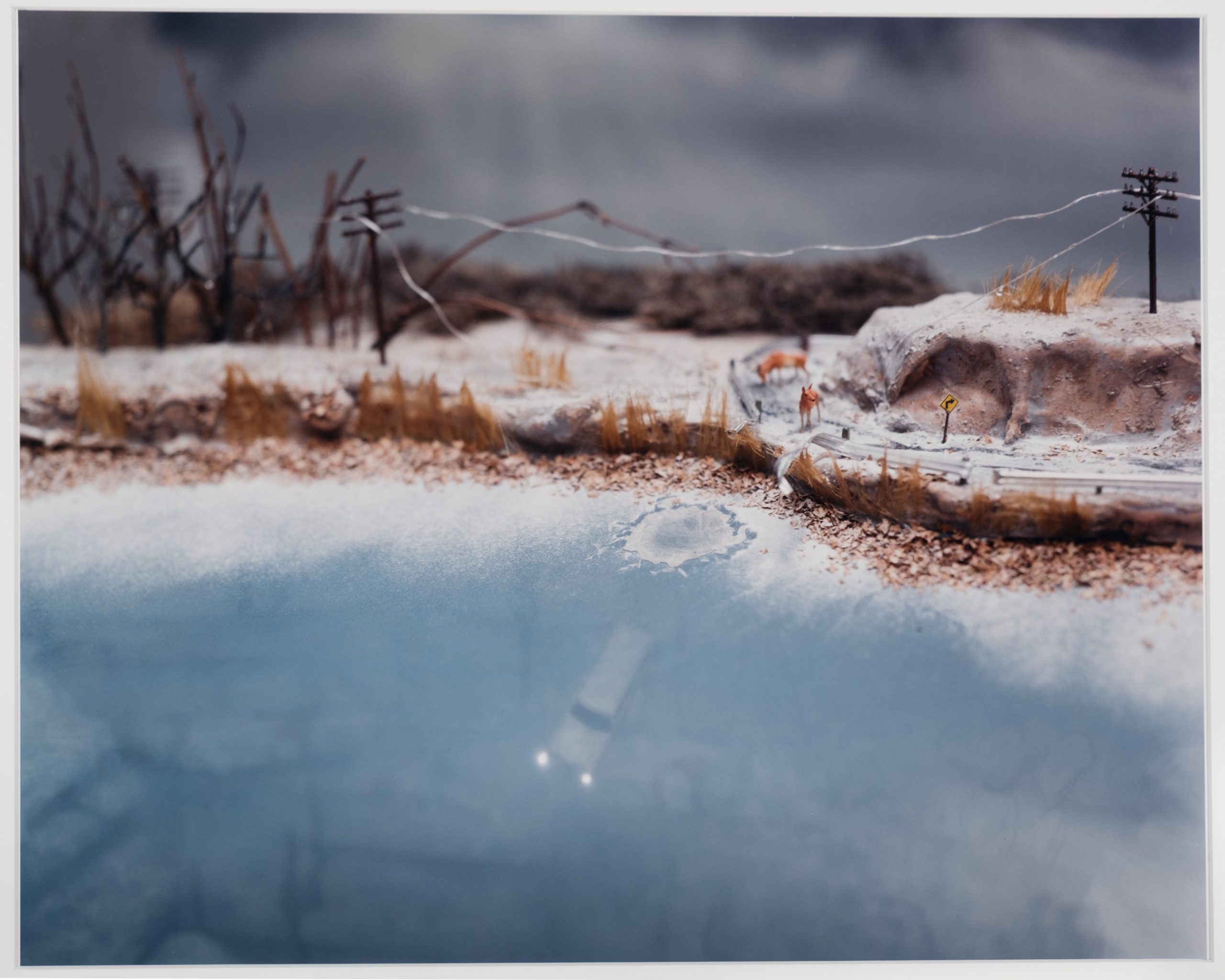 2000.86.2: Diorama of car driven off icy road.
