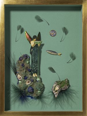 Woman on rock spilling liquid from bowl next to fish.