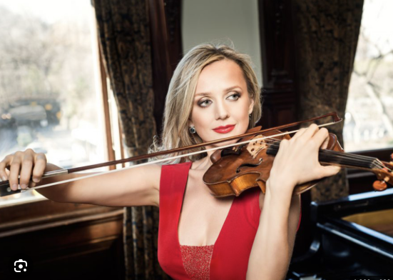 Image of Solomiya Ivakhav playing violin